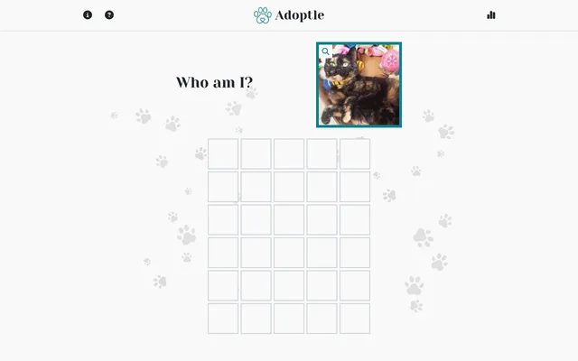 The Adoptle board: the question Who am I? beside a photo of the day's pet, a tortoiseshell cat, above an empty grid of six rows of five tiles