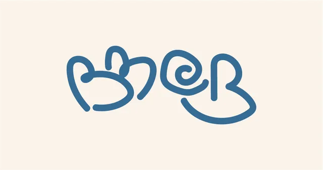 The Beat Me at Boggle logo, BM@B in looping blue letters