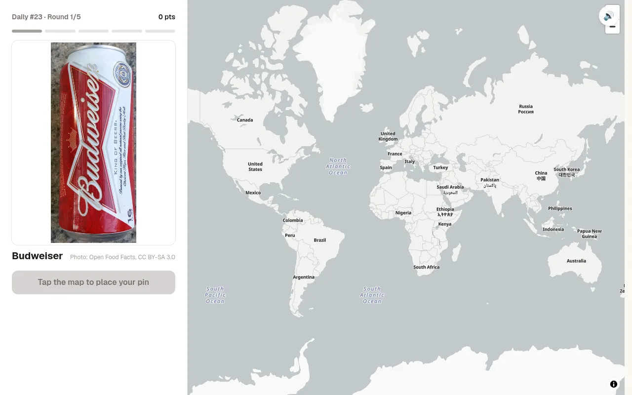 BeerGuessr Daily #23 (23 October 2026), round 1 of 5: a can of Budweiser beside a blank world map waiting for a pin