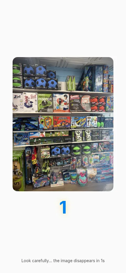 Blinkle on a phone: the same toy shop shelf photo of 27 October 2026 with the countdown at one second