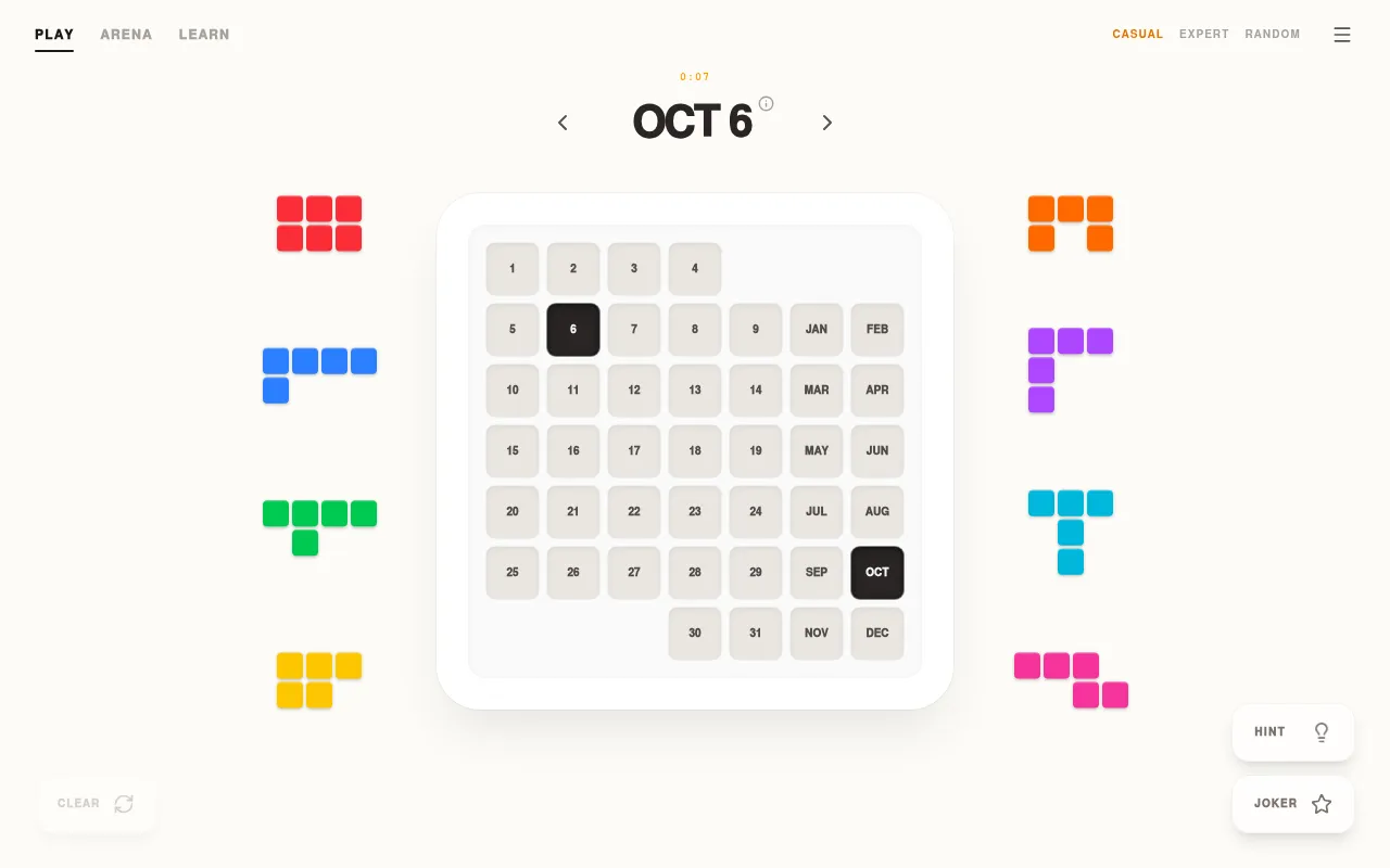 Daily Calendar Puzzle for Oct 6: the empty calendar board with 6 and OCT marked and eight coloured pieces around it