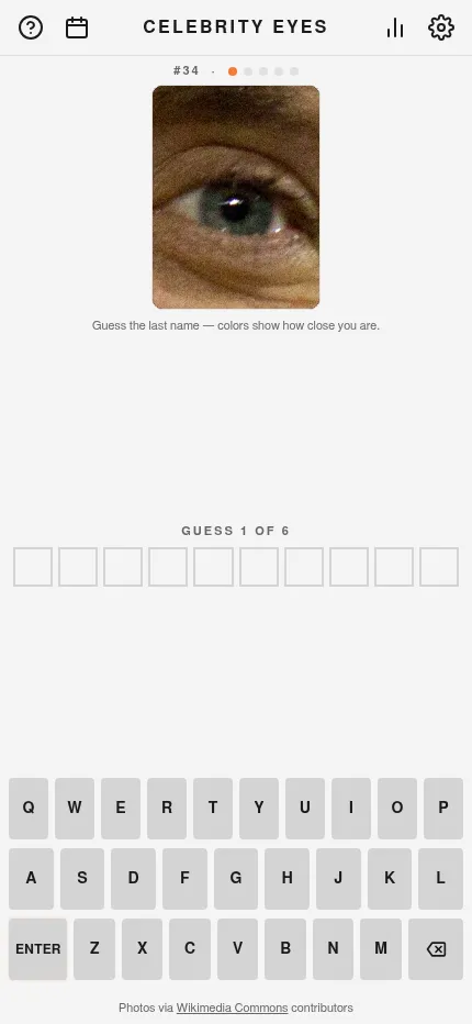 Celebrity Eyes #34 at phone size: the tight crop of the day's eye above an empty ten-letter grid and the keyboard