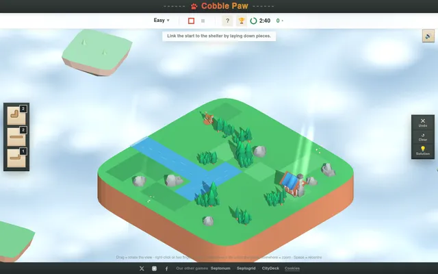 Today's easy Cobble Paw board in play: a 3D grassy island with the dog, a stream, trees and rocks, the shelter on the right, the tray of trail pieces at left and the clock at 2:40