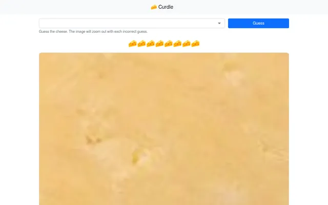 Curdle's board for 21 October 2026: the cheese picker and Guess button above eight cheese-wedge tries and a tight close-up of the day's pale yellow cheese