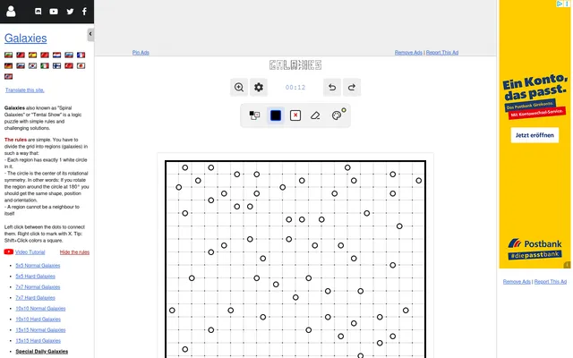 The Special Daily Galaxies on puzzle-galaxies.com: a large dotted grid scattered with white circles, each the centre of a symmetric region to draw