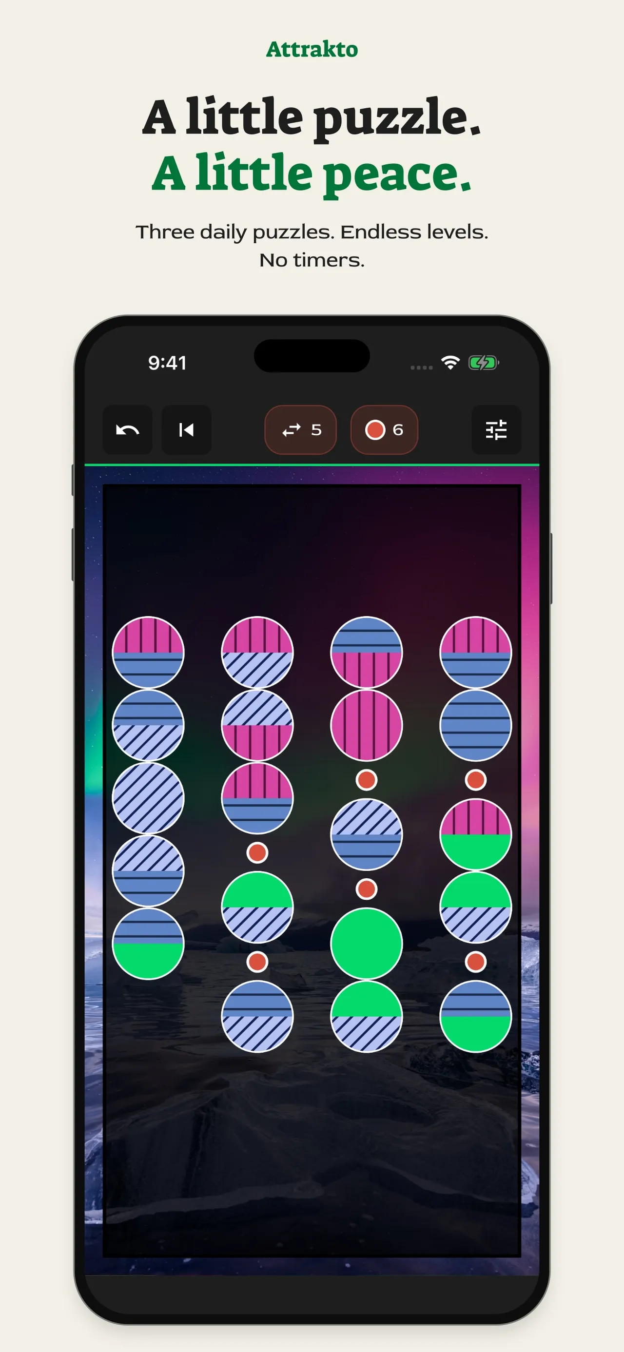 An Attrakto board on an iPhone: four columns of two-toned pieces with red Repulsor dots between mismatched neighbours