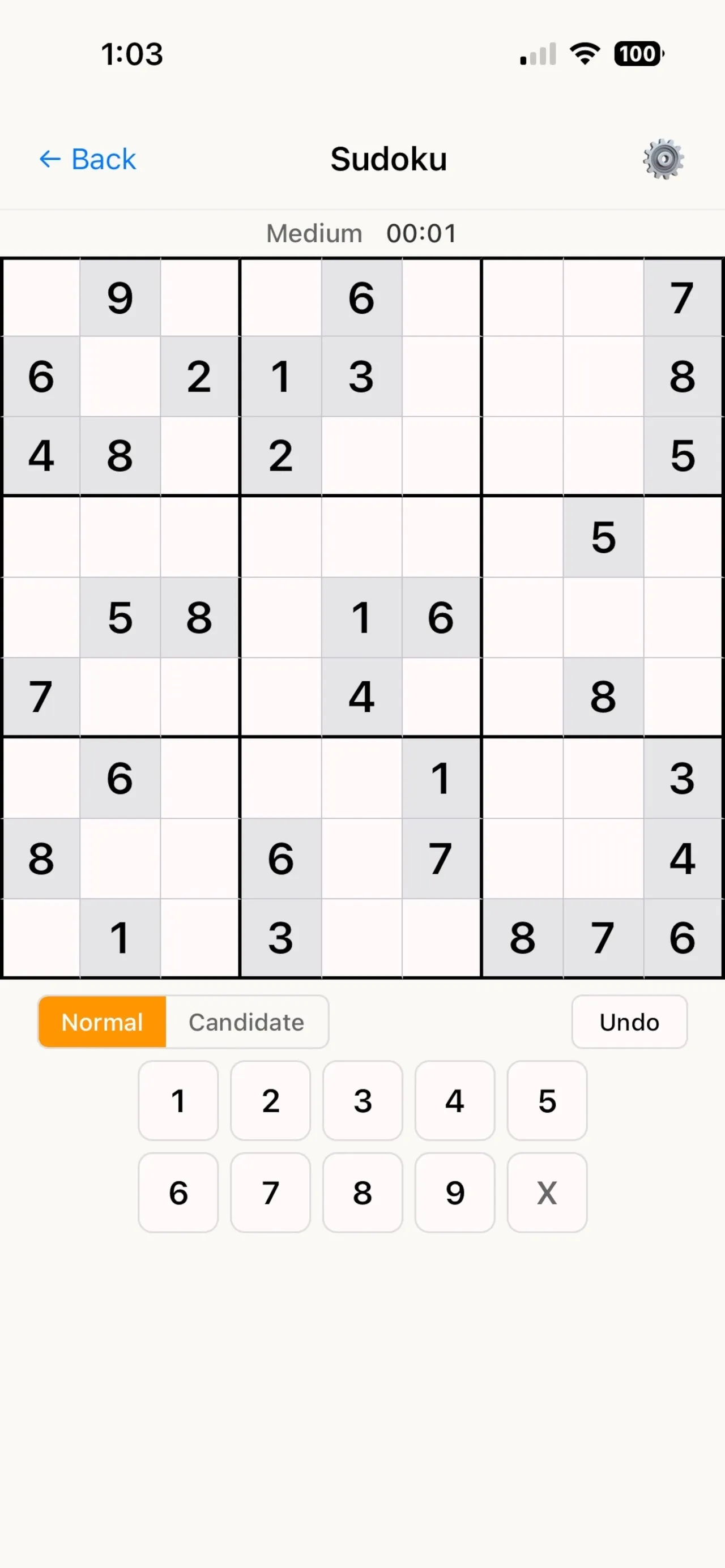 Daily Logic Sudoku at Medium level (App Store screenshot): a 9x9 grid with given digits, Normal and Candidate modes and a number pad