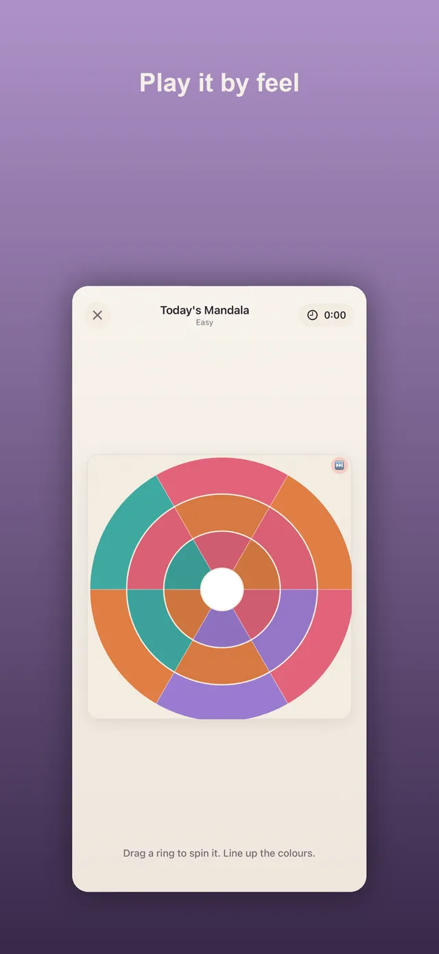Today's Daily Mandala, Easy: three rings of teal, orange, pink and purple wedges turned out of line, with a timer