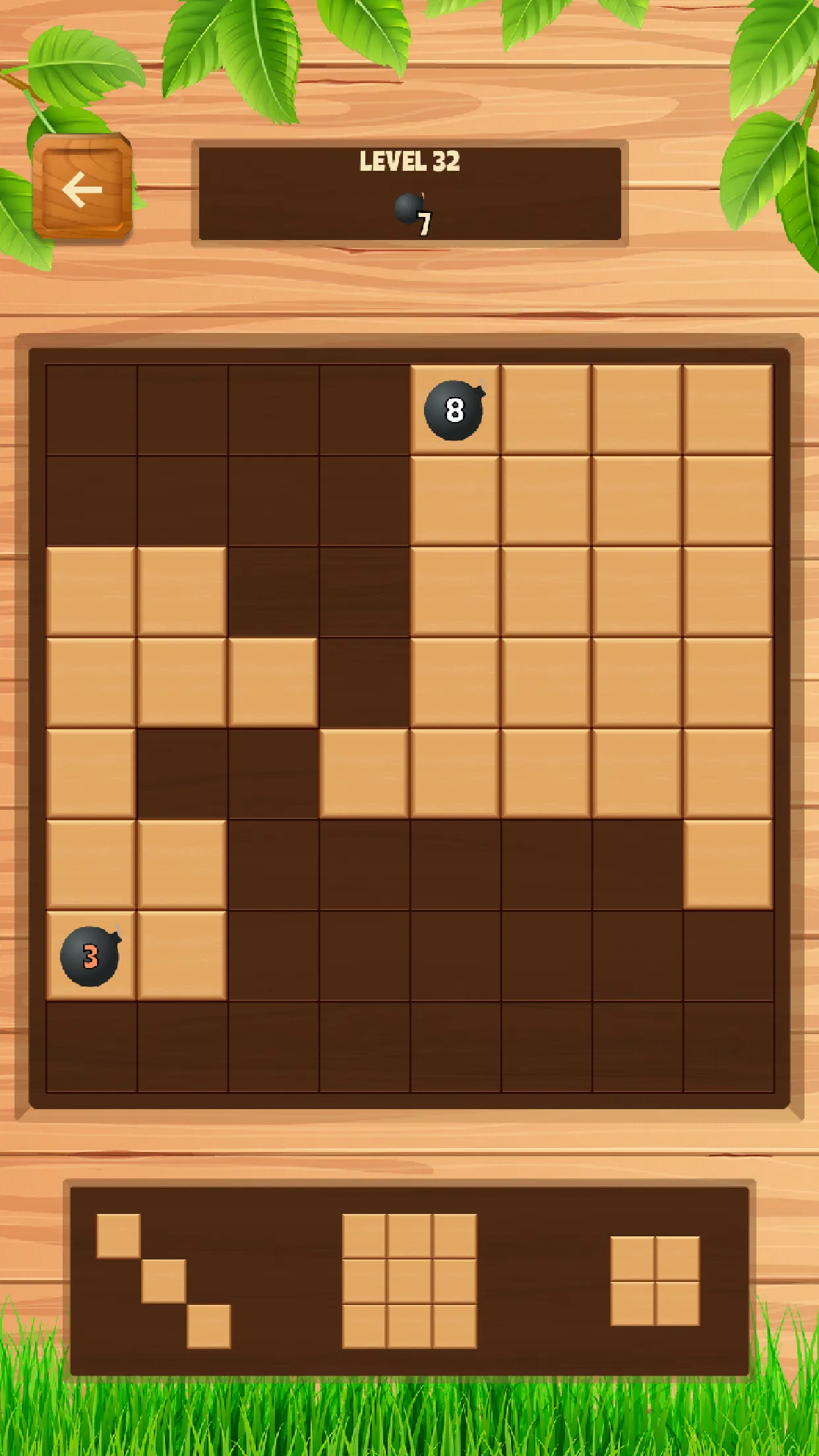 Daily Wood Block Puzzle level 32: a wooden 8x8 board with two counting bomb tiles to clear