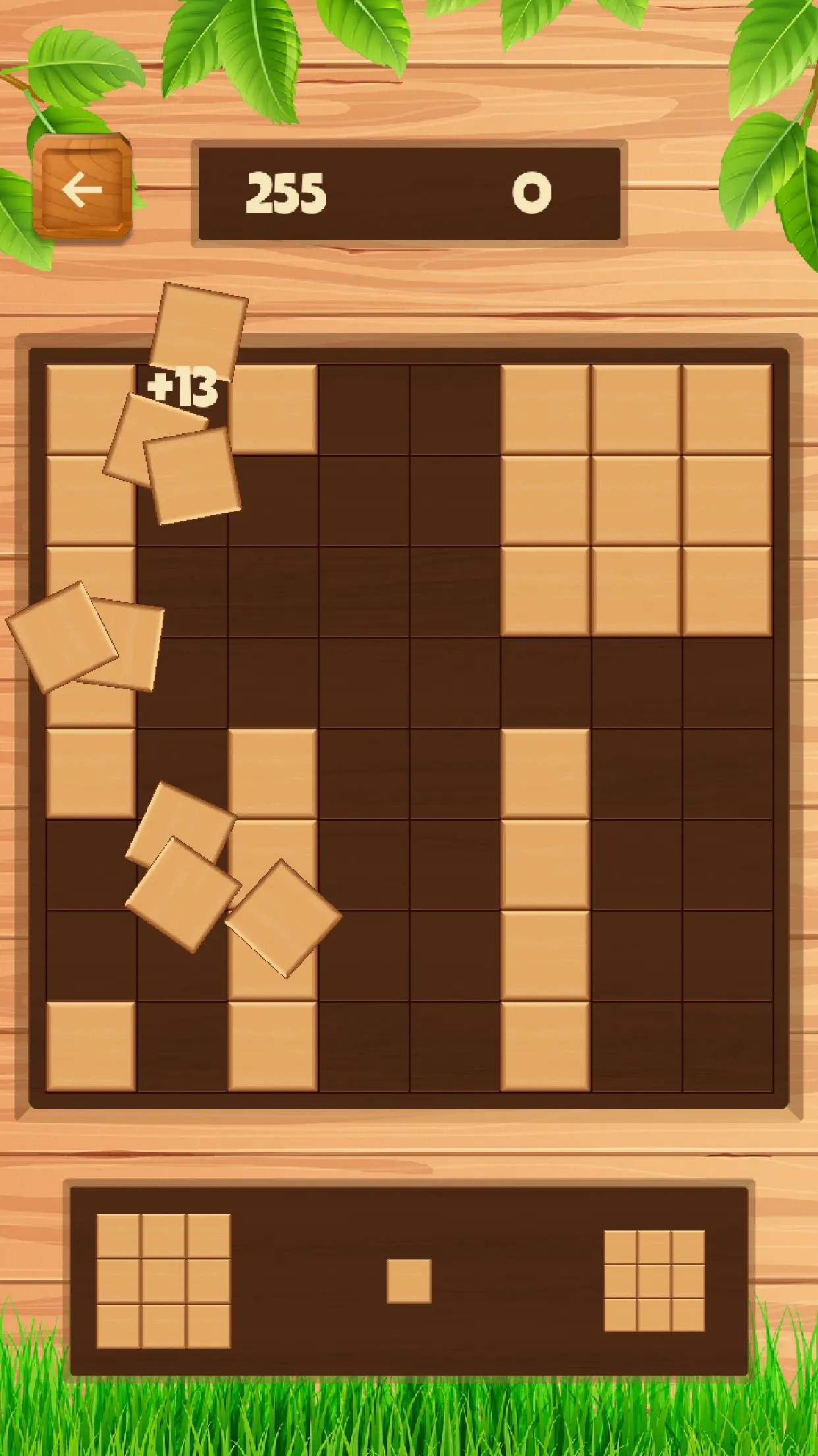 Daily Wood Block Puzzle: blocks falling away from the wooden 8x8 grid after a line clears, with a +13 points popup