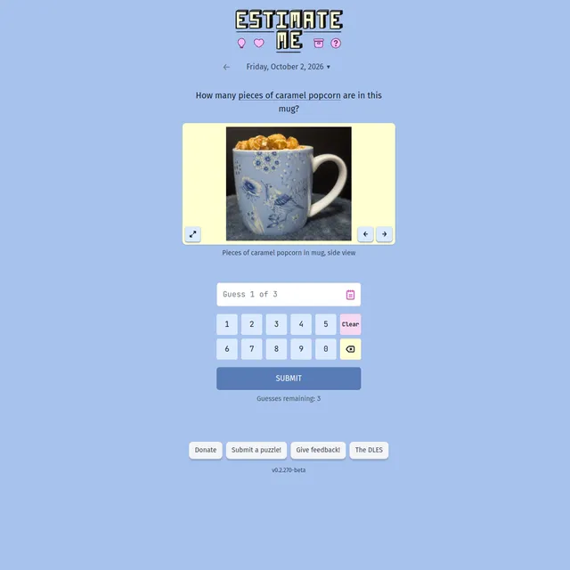Estimate Me puzzle for October 2, 2026: a photo of caramel popcorn in a blue flowered mug, with a number pad for three guesses