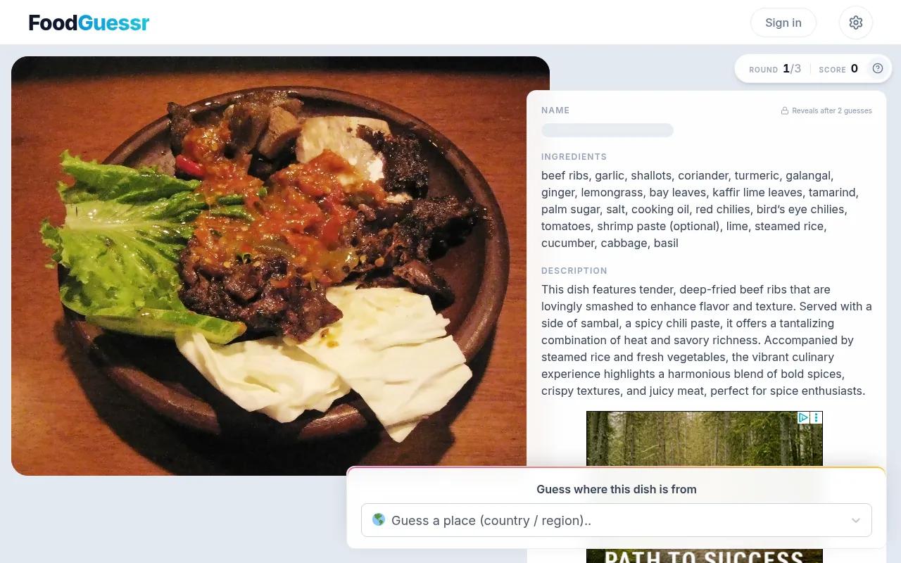 FoodGuessr's daily challenge, round 1 of 3: a photo of smashed fried beef ribs with sambal, lettuce and cabbage, the ingredients and description beside it with the name locked, and a box to guess the