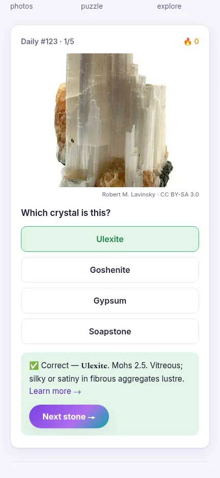 Gemdle Daily #123 on a phone after a correct answer: Ulexite marked green, with its Mohs hardness and lustre and a Next stone button