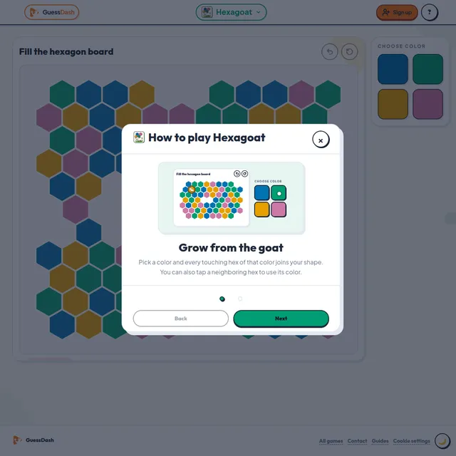 Hexagoat board of coloured hexagons with a colour palette and the How to play panel: Grow from the goat