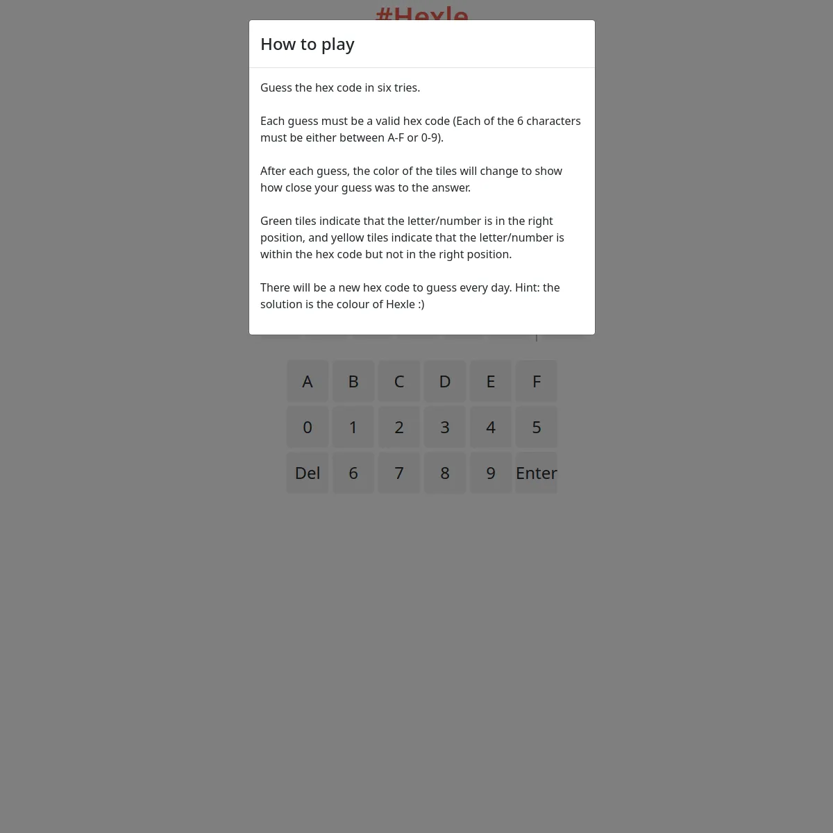 Hexle How to play panel over the hex keypad, explaining green and yellow tiles