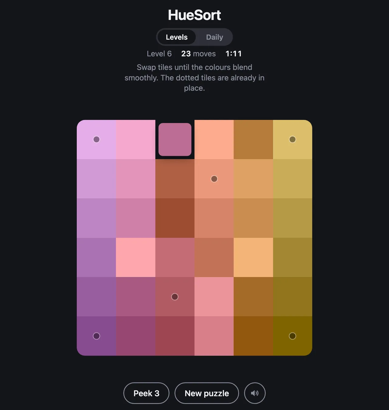 HueSort board of pink, purple, orange and olive tiles being sorted into a gradient, with dotted fixed tiles