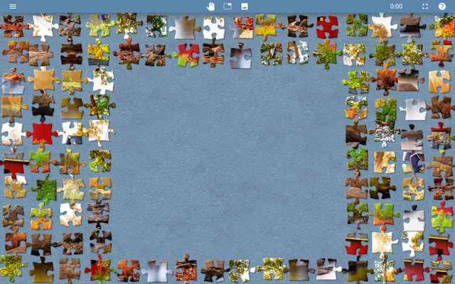 Jigsaw Explorer puzzle player at the start of the 5 October 2026 Daily Jigsaw, a red covered bridge in autumn: the cut pieces laid out around the edges of an empty blue board, with the timer at 0:00
