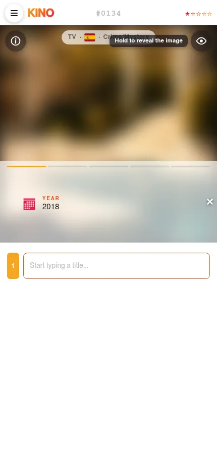 KINO on a phone: the day's blurred picture at the top, the year clue below it and the guess box