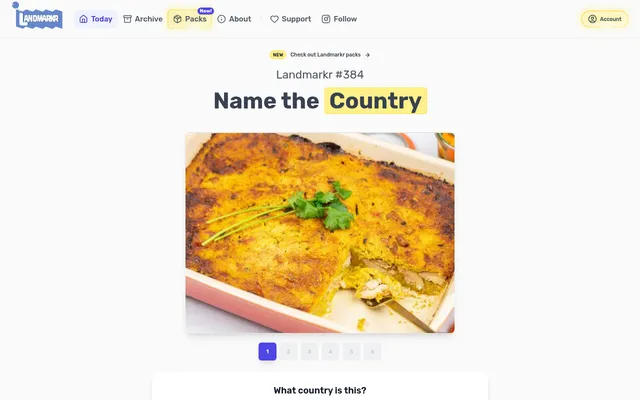 Landmarkr #384, Name the Country, on a desktop: the first of six pictures, a baked casserole with a golden crust, above the guess box