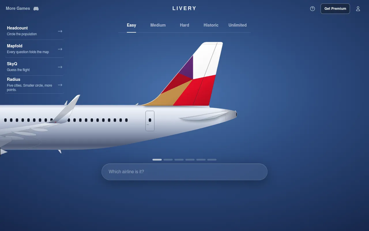 Livery's Easy board on 21 October 2026 at desktop size: a tail fin in blocks of white, red, purple and gold above the Which airline is it? box and six guess markers