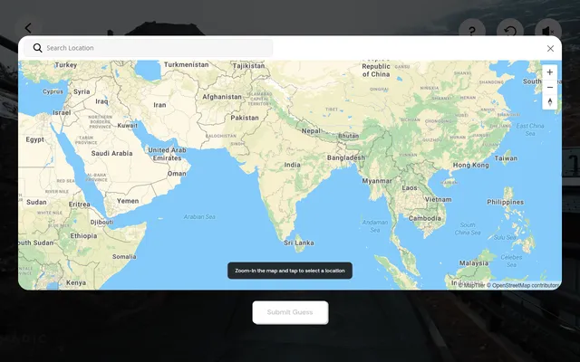 Location Guesser's board today on desktop: the guess map open with a location search box and Submit Guess button over the dimmed daily video clip