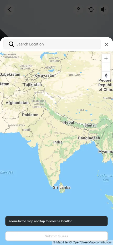 Location Guesser on a phone: the guess map fills the screen with a search box, zoom buttons and a Submit Guess button