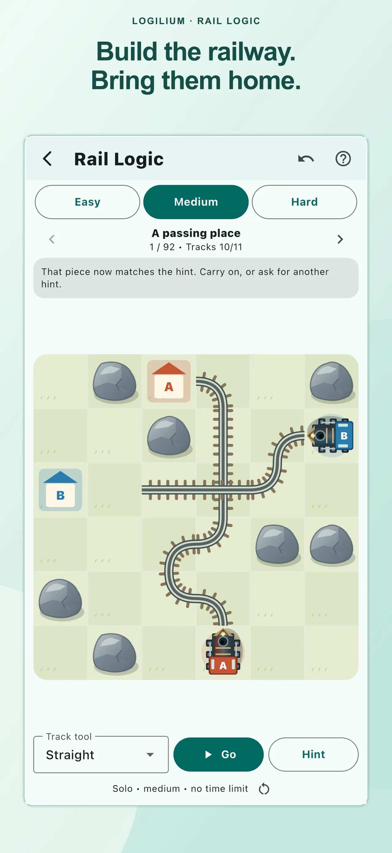 Logilium Rail Logic, Medium: a 6x6 grid of grass and rocks with curved and straight track joining trains A and B to their stations, with Go and Hint buttons below.
