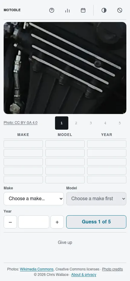 Motodle at phone size: the close-up engine photo above the guess table, menus and Guess button in one column