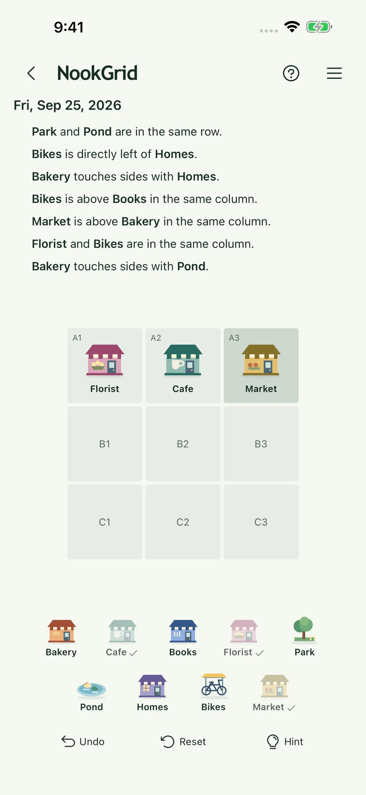 NookGrid on iPhone: the puzzle of 25 September 2026 with Florist, Cafe and Market in the top row, the plan above and the tray below