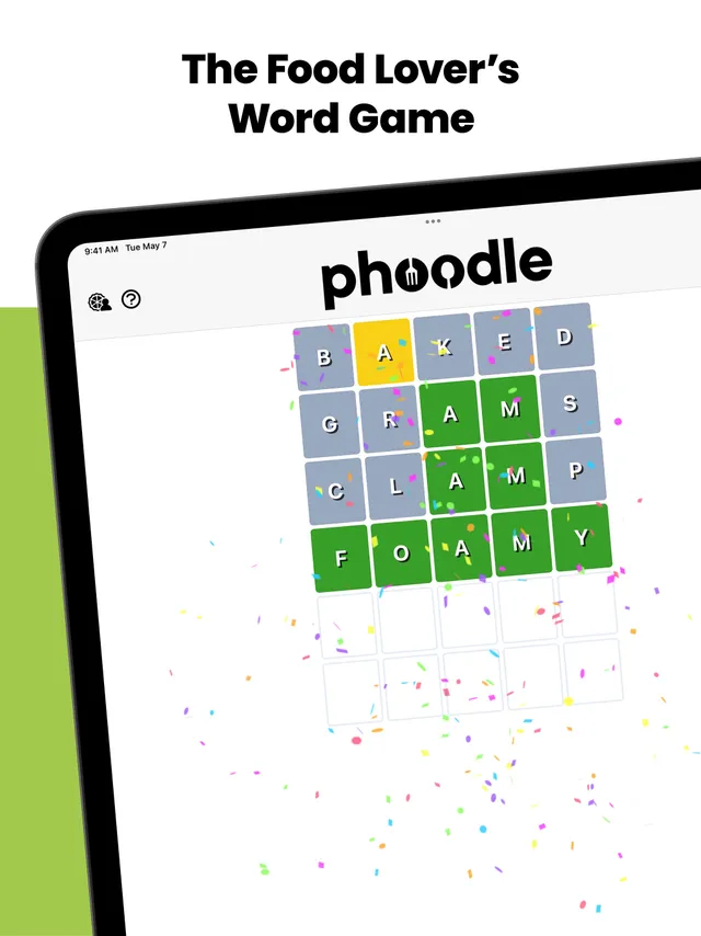 A solved Phoodle board on iPad: four guesses ending in FOAMY in green tiles, with confetti, under the heading The Food Lover's Word Game
