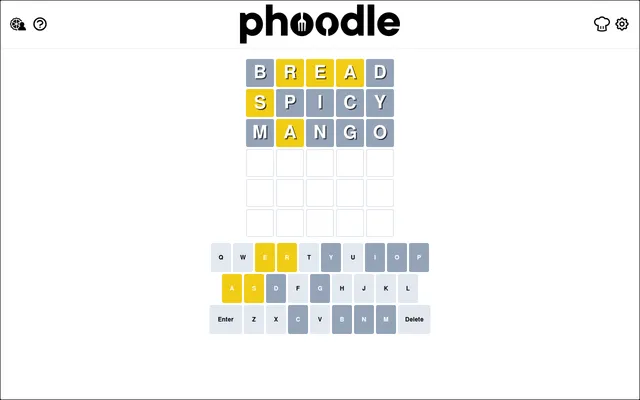 Today's Phoodle board on desktop: three guesses, BREAD, SPICY and MANGO, with yellow and grey tiles above the on-screen keyboard