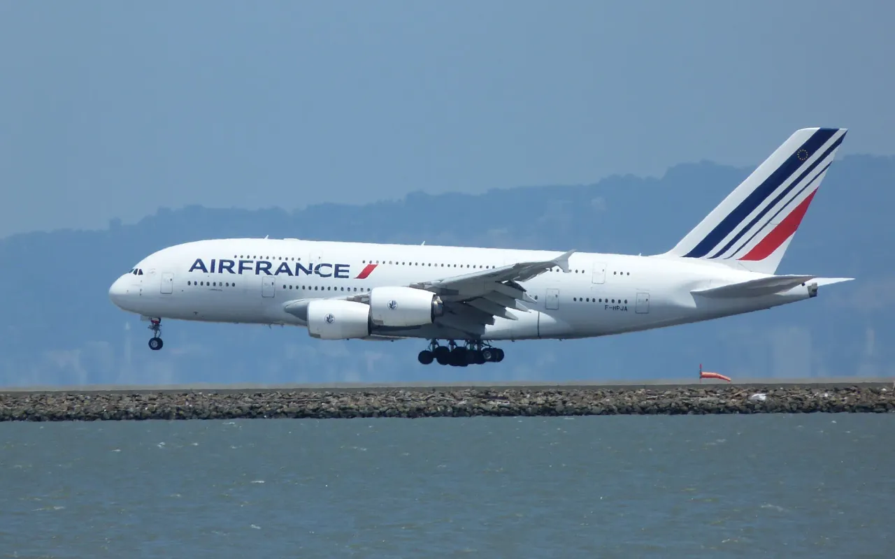 An Air France Airbus A380 landing beside the water, the kind of aircraft photo Planespottle uses