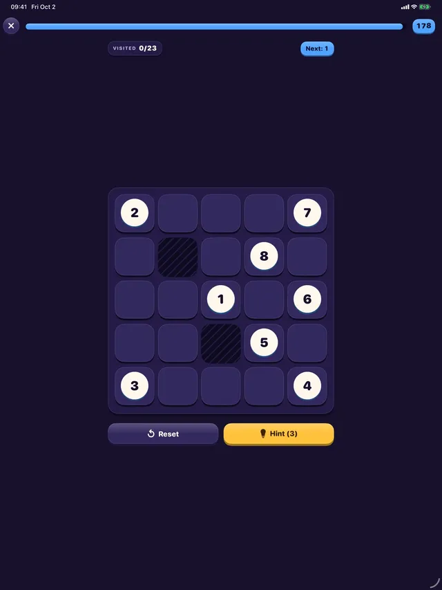 A ShakePlay Chain Path board on iPad: a five by five grid with numbered stops 1 to 8 and two blocked cells, with Reset and Hint buttons below