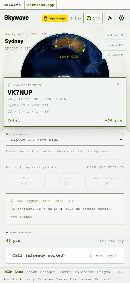 Skywave at phone size: a confirmed FT8 contact with VK7NUP on 20m over 3,287 km scoring 66 points, with the radio desk below the globe
