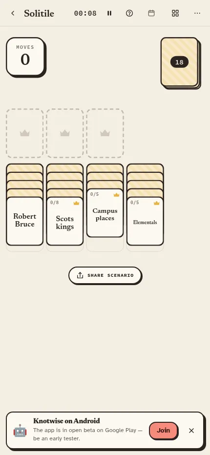 The same Wednesday Solitile deal at phone size: moves counter, draw pile, three crowned slots and four columns of word cards