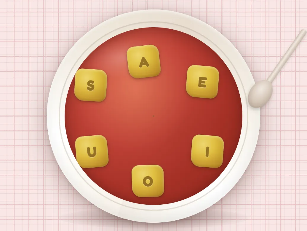 Soup of the Day art: a bowl of tomato soup with yellow letter tiles A, E, I, O, U and S floating in a ring, and a spoon at the rim