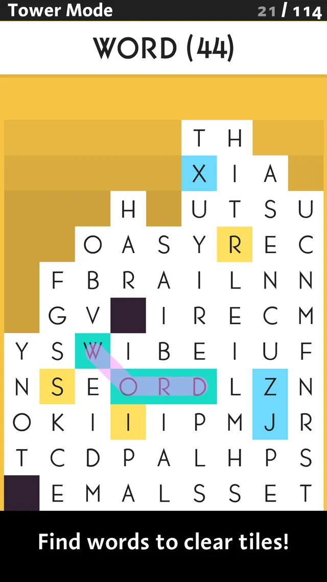A SpellTower puzzle board of stacked letter tiles