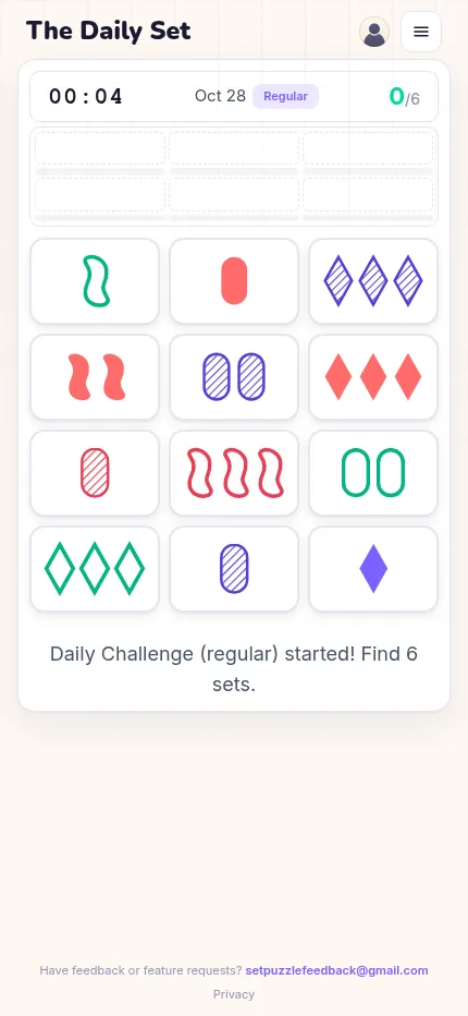 The Daily Set on a phone for October 28, 2026: the twelve cards in a three by four grid under the timer and six small slots for found sets