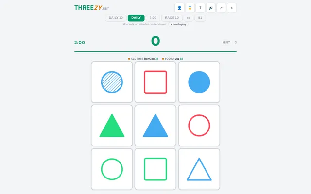 Threezy's Daily mode on 21 Oct 2026 at desktop size: a 2:00 timer, a score of 0 and today's three by three board of red, green and blue circles, squares and triangles