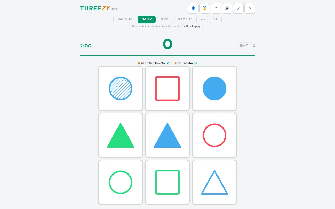 Threezy's Daily mode on 21 Oct 2026 at desktop size: a 2:00 timer, a score of 0 and today's three by three board of red, green and blue circles, squares and triangles