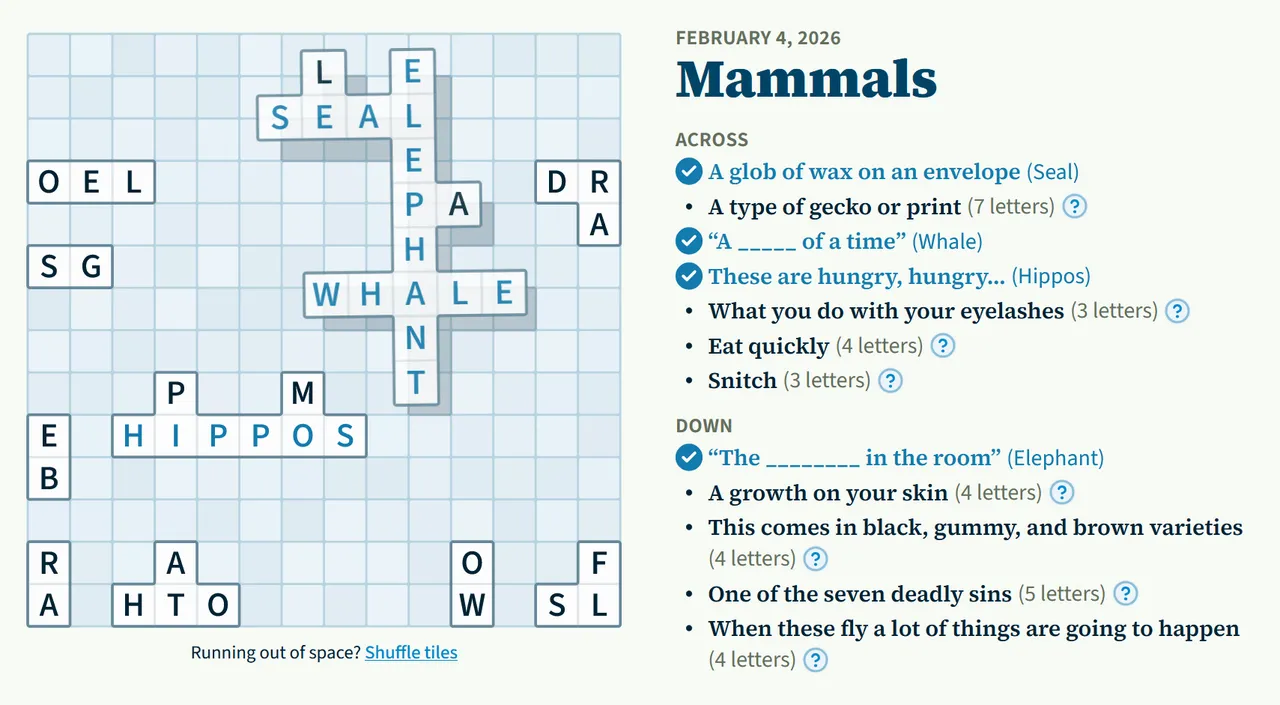 Tiled Words press screenshot of the Mammals puzzle with SEAL, WHALE, HIPPOS and ELEPHANT rebuilt and their clues ticked