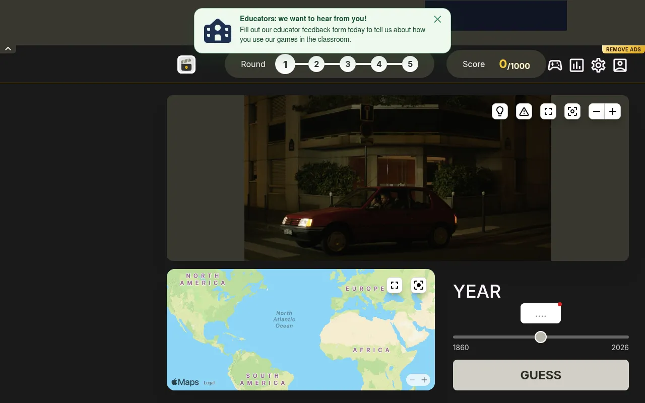 WhenTaken Movies round 1 of 5: a film still of a red car at night on a street corner, above a world map to place the scene and a year slider from 1860 to 2026 with a Guess button