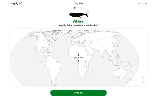 Where? roughly. Day 300 on desktop: a humpback whale silhouette above a blank world map with a crosshair in the middle and a green Drop pin button