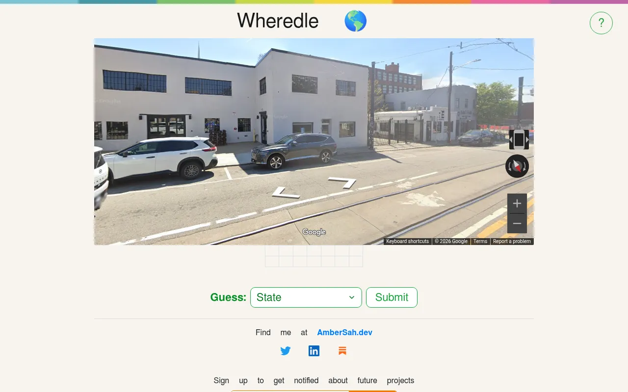 Wheredle's daily Street View scene of a city street with the state guess drop-down and Submit button
