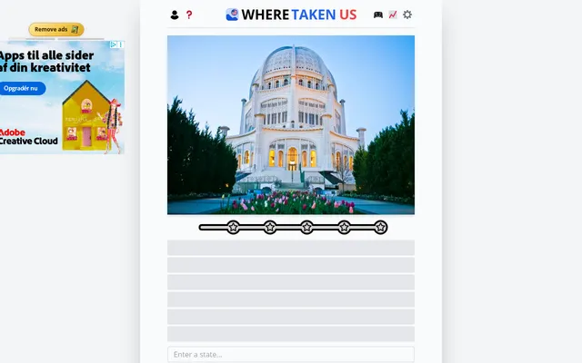WhereTaken US on 20 October 2026: the day's photo of a domed white temple behind tulip beds, the five-star bar, six empty guess rows and an Enter a state box, an ad in the left margin