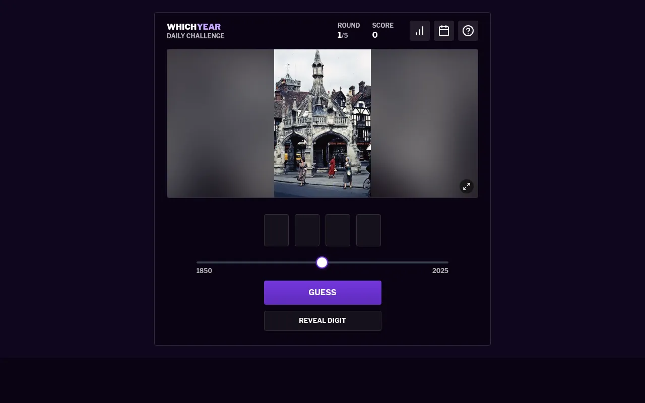 Which Year daily challenge, round 1 of 5: a colour street photo of a Gothic market cross, with four empty year boxes, a 1850 to 2025 slider and Guess and Reveal Digit buttons