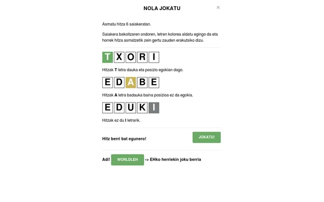 The Wordle (EUS) help card in Basque: example words TXORI, EDABE and EDUKI with green, yellow and grey tiles, and the line Hitz berri bat egunero (a new word every day)
