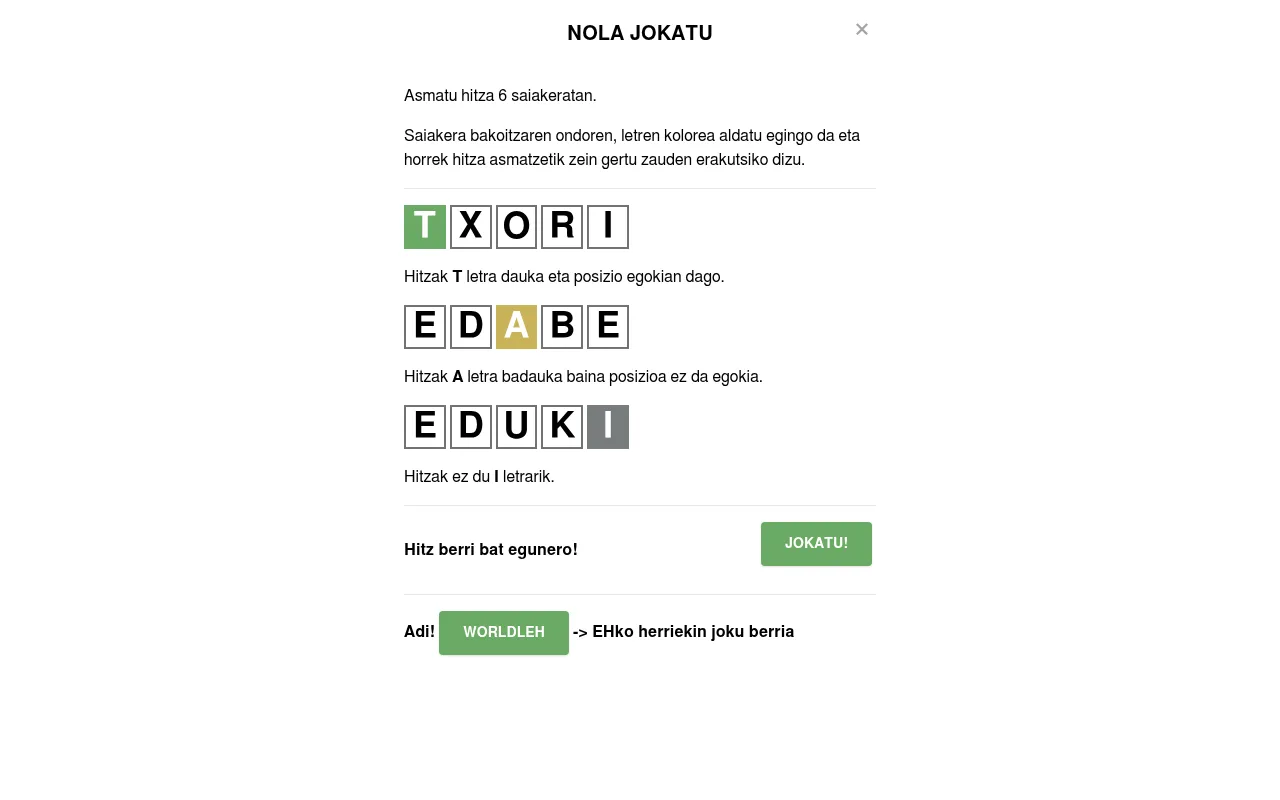 The Wordle (EUS) help card in Basque: example words TXORI, EDABE and EDUKI with green, yellow and grey tiles, and the line Hitz berri bat egunero (a new word every day)