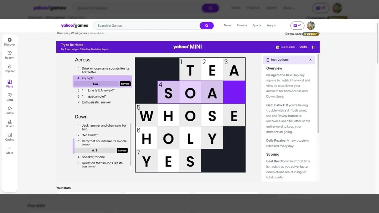 Yahoo Mini crossword in play: a 5x5 grid with clues listed on the left and instructions on the right