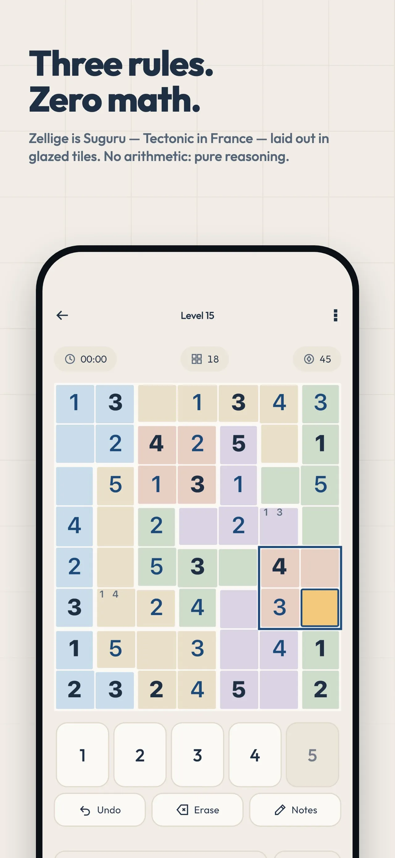 Zellige level 15, a smaller Suguru grid in blue, beige, pink, lilac and green blocks with one block outlined and pencil notes in two cells